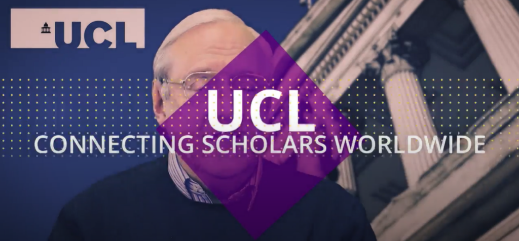 Screenshot from video. Purple diamond superimposed over a man (UCL Press CEO, Paul Ayris) talking. White text reads: 'UCL: Connecting scholars worldwide'