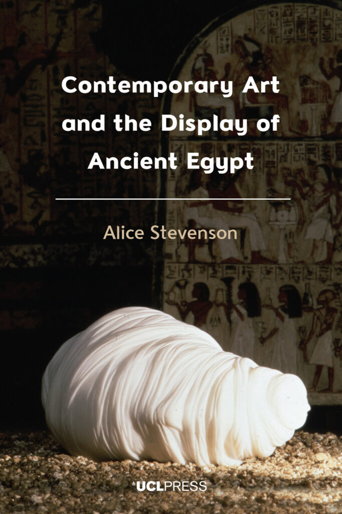 The image displays the cover of the book ‘Contemporary Art and the Display of Ancient Egypt’ by Alice Stevenson. The cover features an ancient Egyptian wall painting in the background with figures in traditional attire, and a modern white sculpture in the foreground.