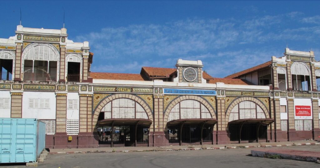 The image shows the Malian market at the railway terminus in Dakar, as featured on the cover of Urban Displacement and Trade in a Senegalese Market.