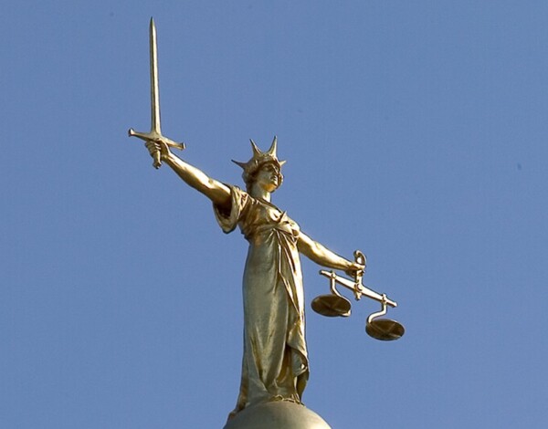The statue at the top of the Central Criminal Court (known as the Old Bailey) in London. The dome is topped by a bronze statue of Justice by sculptor F.W. Pomeroy.